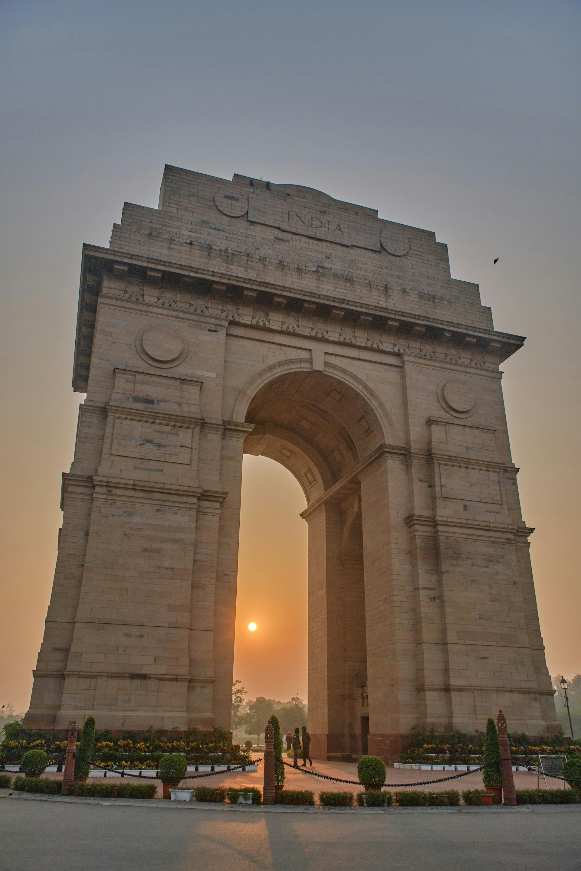 India Gate and tree-lined grounds — iconic Delhi landmark and civic buildings