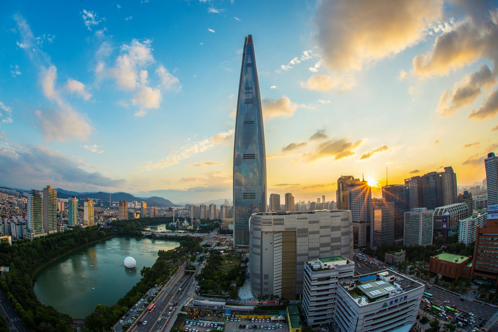 Seoul skyline at golden hour — high-rises and riverfront buildings